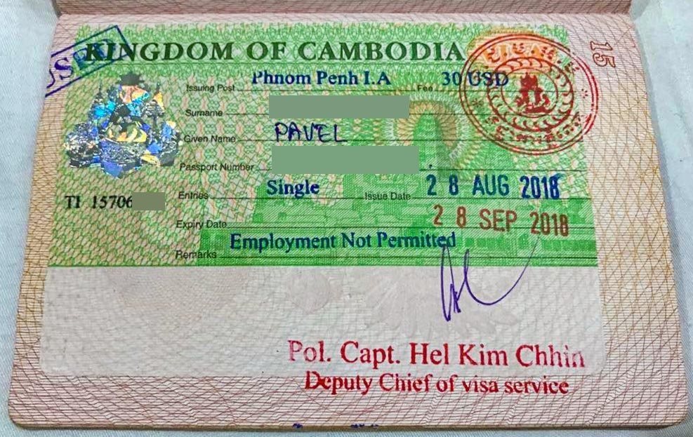 Old full-page Cambodia visa sticker in passport